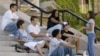 Peer advisor Brittney Parkinson, right, talks with student members of the engineering and computer science pathfinder group at Syracuse University in Syracuse, N.Y., Friday, Aug. 26, 2005. The university is showing an increase in the recruitment and reten