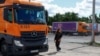 Driver Liliia Shulha walks to her truck at a compound of a logistics company, amid Russia's attack on Ukraine, in the village of Trebukhiv, Kyiv region, Ukraine Aug. 13, 2024.