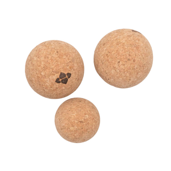 Three cork massage balls. 