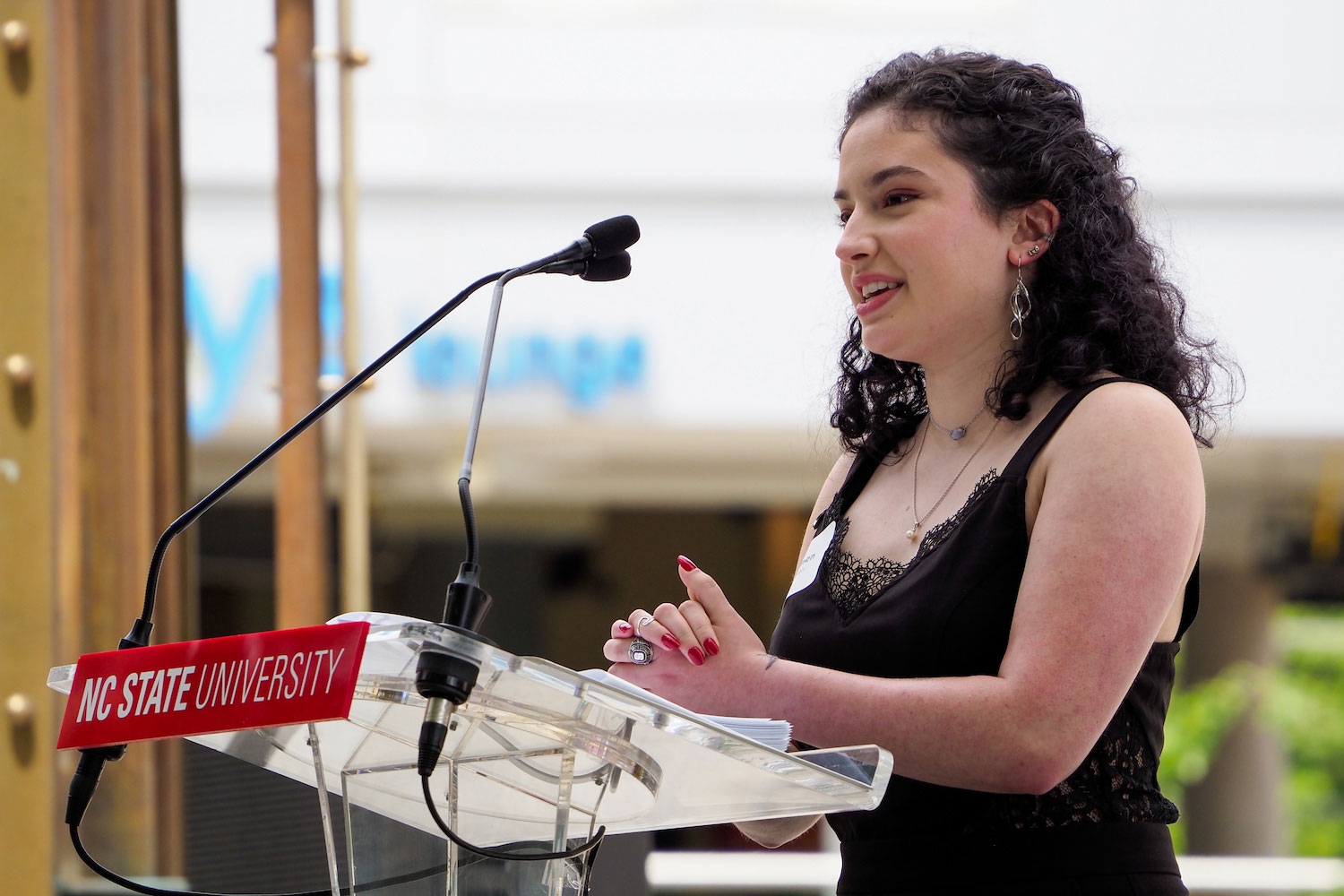 Class of 2021 CAS graduate Carmen Bollman explaining to the audience what the Belltower has meant to her.