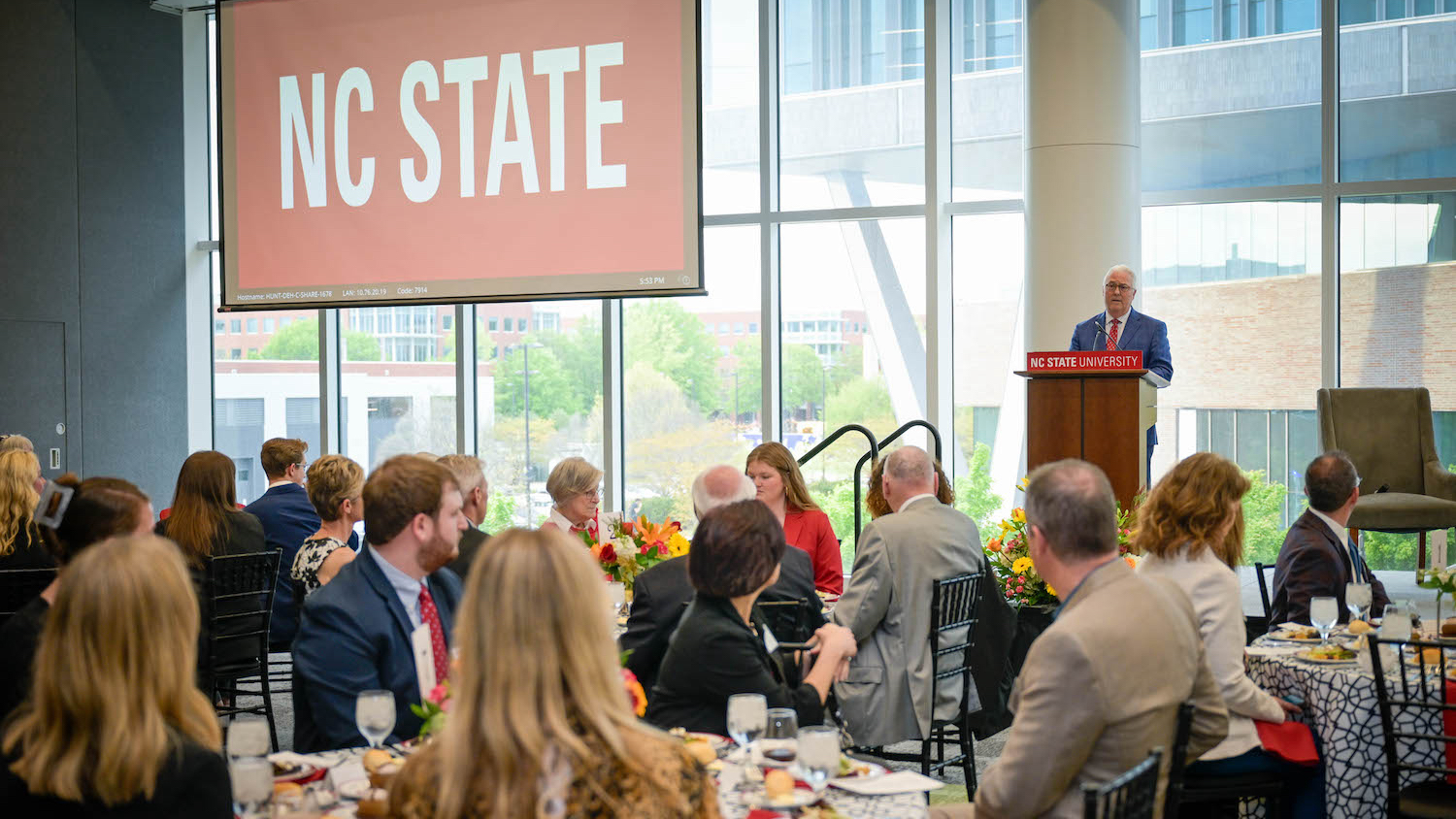 Chancellor Woodson addresses dinner attendees