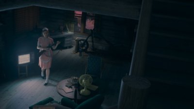 《Alan Wake 2》：「夜泉」螢幕截圖，顯示拿著霰彈槍的護理師