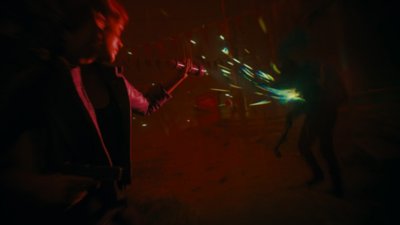 ALan Wake 2: Night Springs screenshot showing Alan directing torchlight at an enemy
