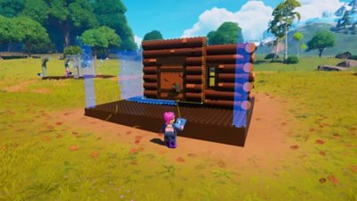 Lego Fortnite-screenshot van een LEGO-minifiguur die een huisje bouwt.