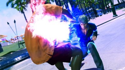 Like a Dragon: Infinite Wealth screenshot showing Kazuma dealing a powerful blow to an enemy.