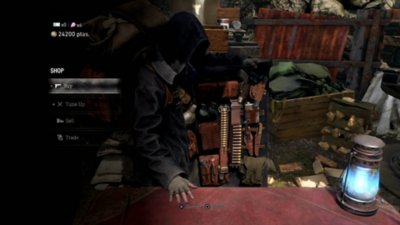 Resident Evil 4-screenshot van The Merchant die zijn goederen verkoopt