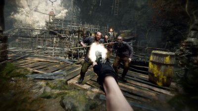 Resident Evil 4 – captură de ecran care arată inamici care atacă și pe Leon reîncărcând o armă