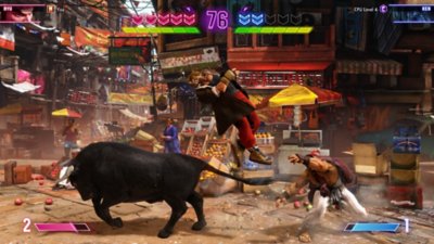 Street Fighter 6 – snímka obrazovky zobrazujúca Kena zrazeného útočiacim býkom