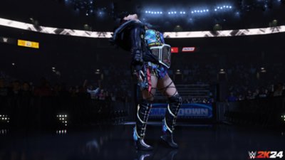 Captura de pantalla de WWE 2K24 que muestra a la superestrella Iyo Sky llevando el cinturón de campeona en el ring