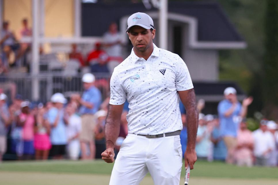 GREENSBORO, NORTH CAROLINA - AUGUST 11: Aaron Rai of England reacts on the 18th green during the final round of the Wyndham Championship at Sedgefield Country Club on August 11, 2024 in Greensboro, North Carolina. (Photo by David Jensen/Getty Images)