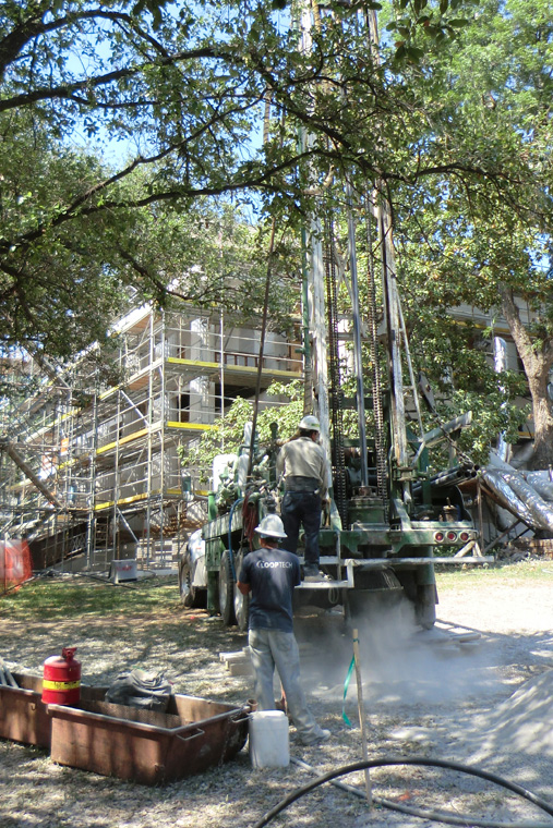 Workers Drill Ground Wells for Geoechange System