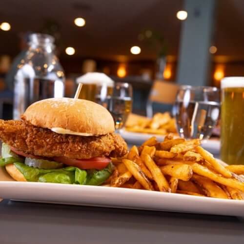 Chicken Sandwich, fries and a beer.