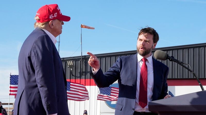 FILE - Sen. J.D. Vance, R-Ohio, right, points toward Republican presidential candidate former...