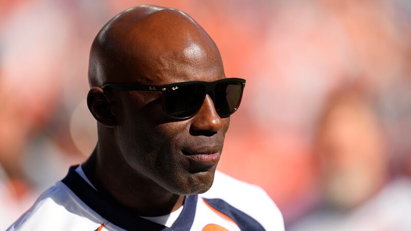 Former Denver Broncos running back Terrell Davis looks on during a half time ceremony at an...