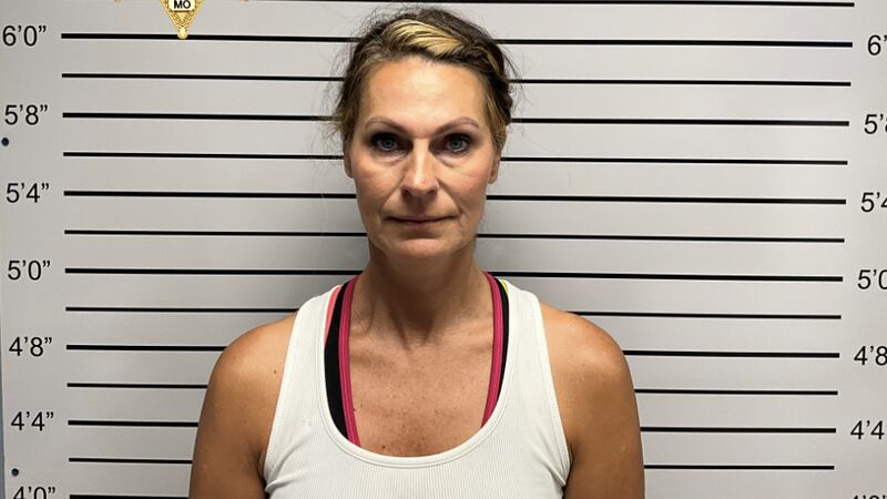 Michelle Y. Peters, 47, faces charges of first-degree domestic assault and armed criminal action.