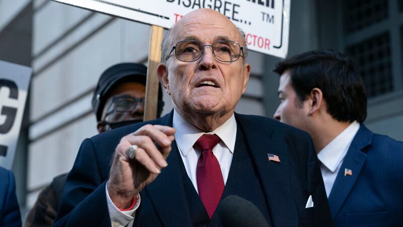 FILE - Former Mayor of New York Rudy Giuliani speaks during a news conference outside the...