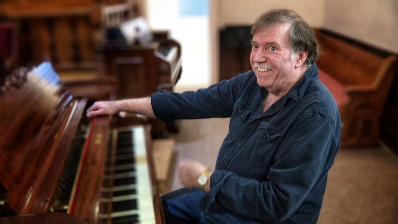 Bruce Stevens behind the organ at the Wells River Congregational Church.