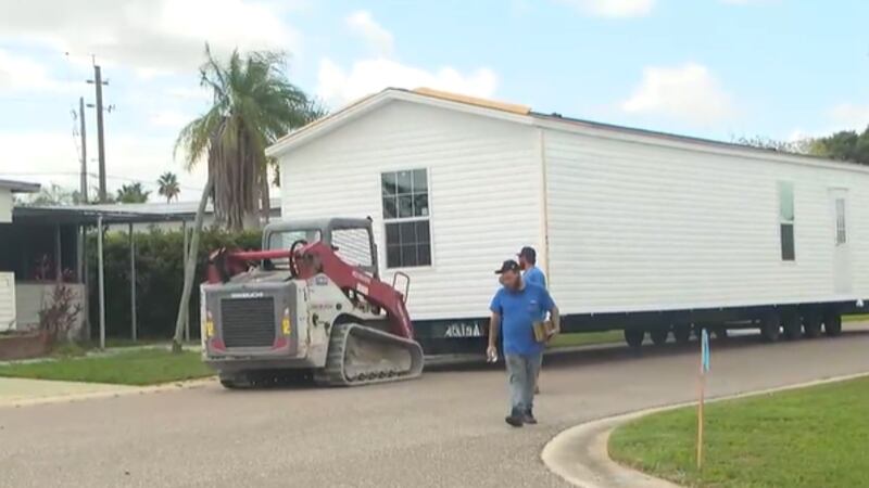 Couple receives new home one year after fire