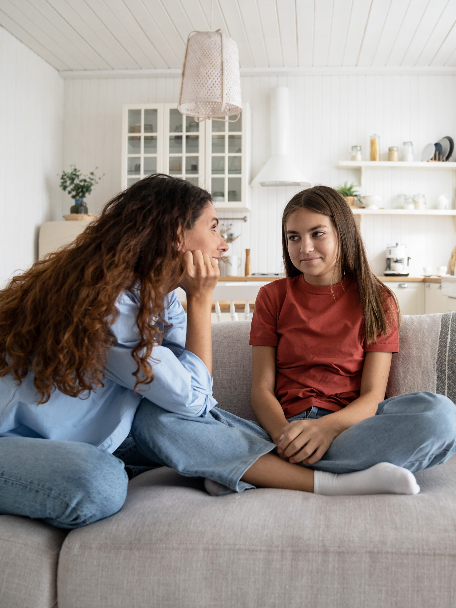 Parent and teen talking about periods (menstruation)