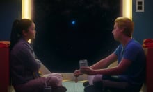 Lana Condor and Cole Sprouse share longing looks on a spaceship in "Moonshot"