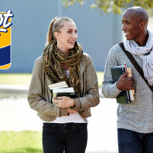 African American boy and white girl at college - stock photo