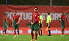 Ronaldo stands on the pitch