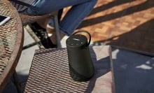 bose soundlink revolve+ speaker on an outdoor table