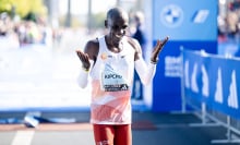 Eliud Kipchoge celebrates as first male finisher during the 2023 BMW Berlin-Marathon 