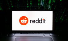a computer with a Reddit Logo