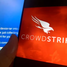 CrowdStrike logo over the Blue Screen of Death