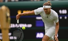 Alexander Zverev returns the ball at Wimbledon