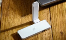 Silver VPN hardware piece with white plug-in