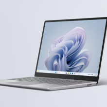 the microsoft surface laptop go 3 against a pale blue background