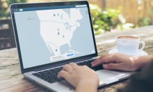 Laptop with vpn map of USA with pinpoints on it