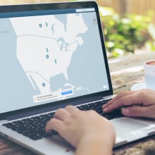 Laptop with vpn map of USA with pinpoints on it