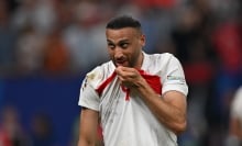 Cenk Tosun of Turkiye celebrates