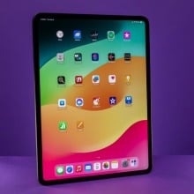 13-inch iPad Pro with purple background