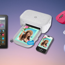 Fire tablet, HP printer, Logitech mouse, and Soundcore earbuds with pink and purple background