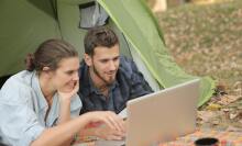 Couple looking at laptop