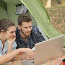 Couple looking at laptop