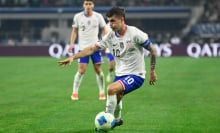 Christian Pulisic of the United States drives the ball