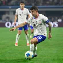 Christian Pulisic of the United States drives the ball