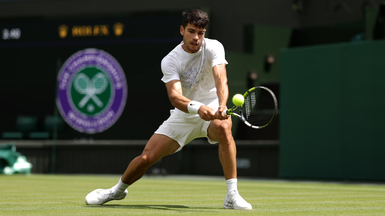 Carlos Alcaraz of Spain plays a backhand