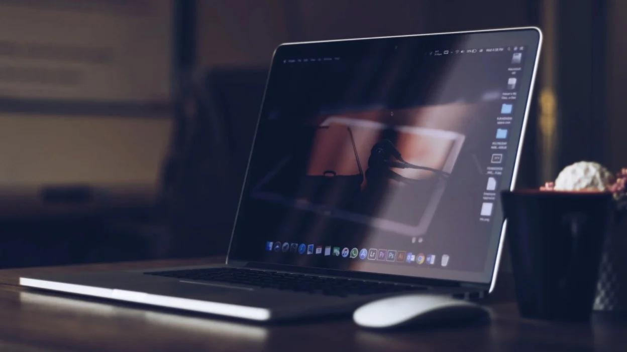 laptop and mouse on desk