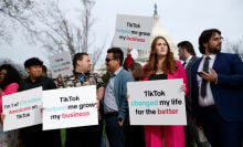 Participants hold signs in support of TikTok outside the U.S. Capitol Building on March 13, 2024 in Washington, DC.