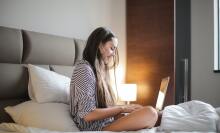 Girl looking at laptop