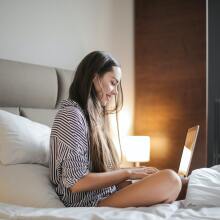 Girl looking at laptop