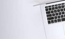 Half of a macbook on white background