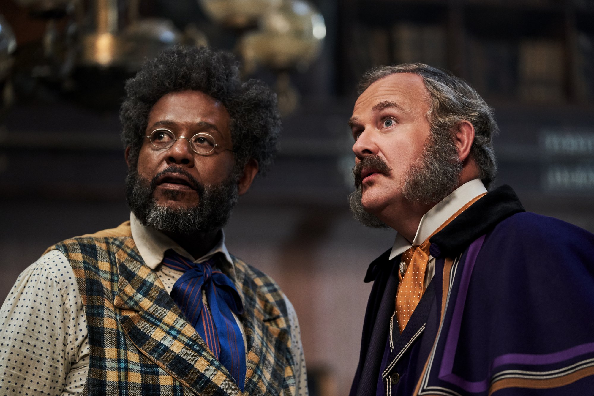 Forest Whitaker and Hugh Bonneville look off camera in "Jingle Jangle: A Christmas Journey."