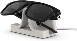 a pair of Carrera Smart Glasses with Alexa sit on the included charging stant